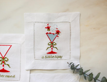 Christmas embroidered cocktail napkin – martini glass with elves, holiday party linen coaster with the phrase a little tipsy.